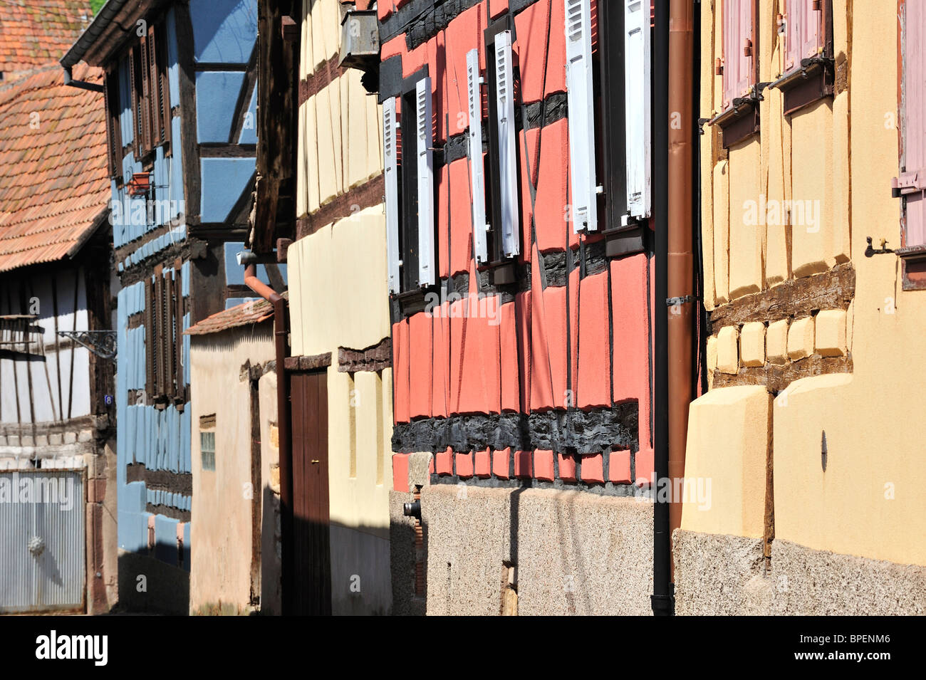 Colorful façades of timber framed houses at Dambach-la-Ville, Alsace, France Stock Photo