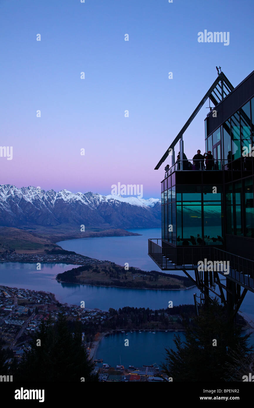 Dusk over Skyline Restaurant, The Remarkables and Lake Wakatipu, Queenstown, South Island, New Zealand Stock Photo