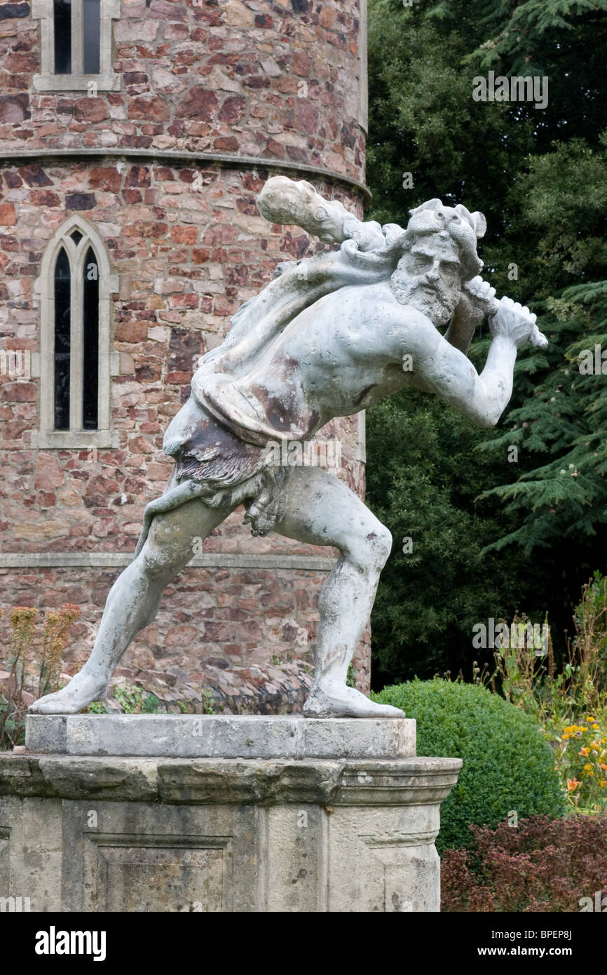 Lead statue of Hercules or Heracles with club and lion skin garment in the grounds of Goldney Hall Clifton Bristol Stock Photo