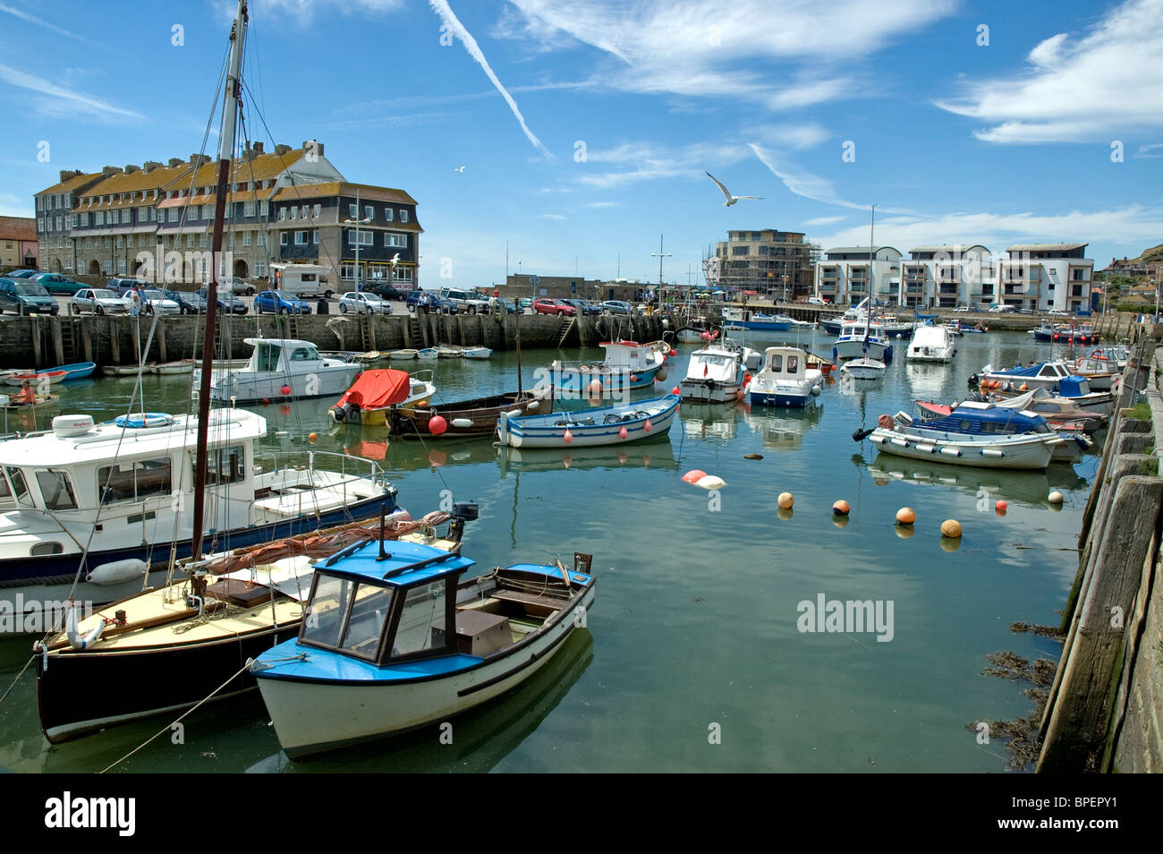 Yachts, Motor and Fishing Boats in West Bay Harbour, Dorset Stock Photo ...