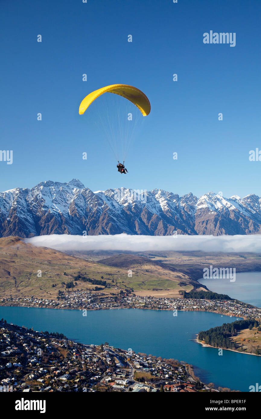 Paraglider, The Remarkables and Lake Wakatipu, Queenstown, South Island, New Zealand Stock Photo