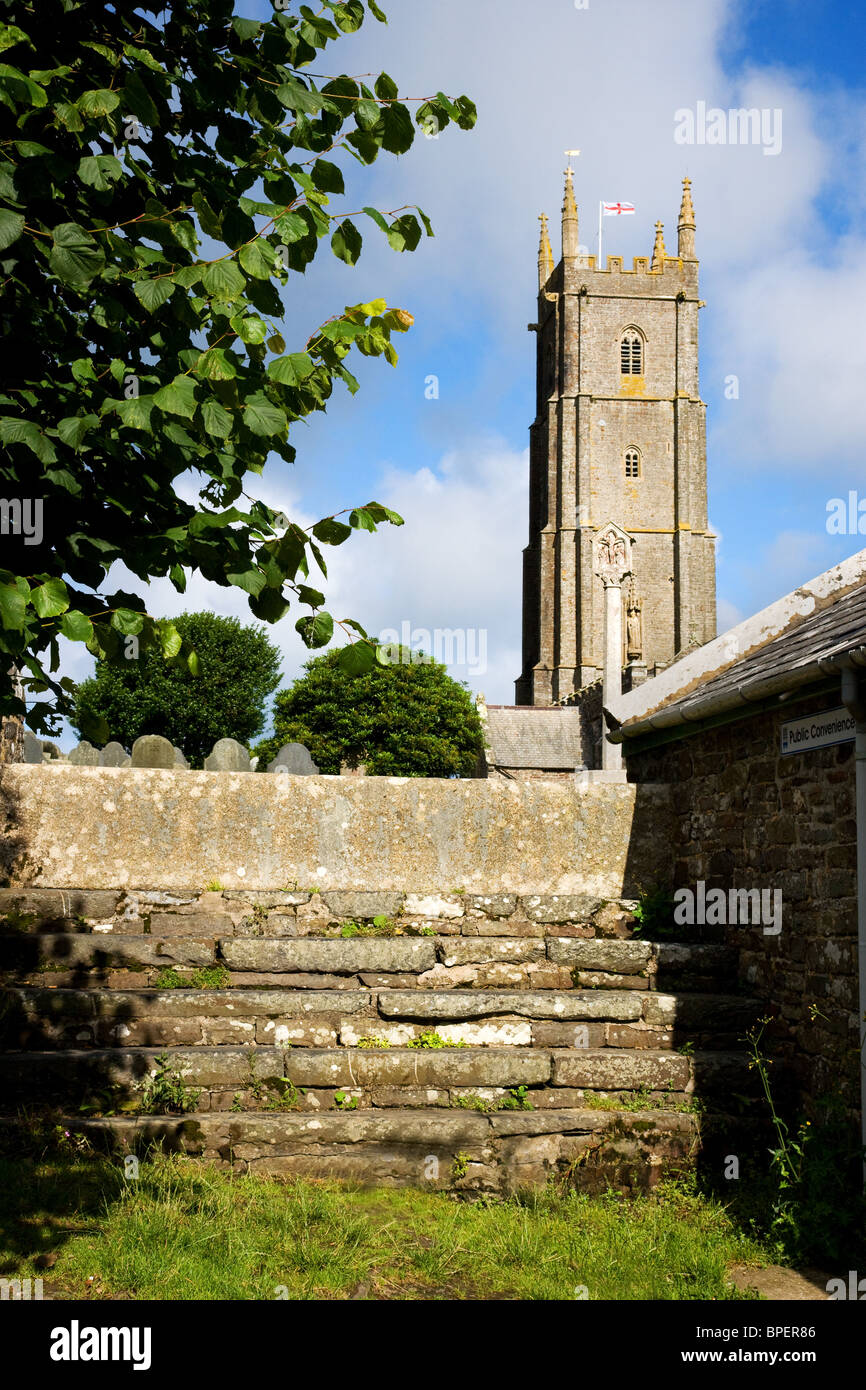 Tower of St Nectan's church at Stoke in North Devon with steps and stile in the foreground Stock Photo