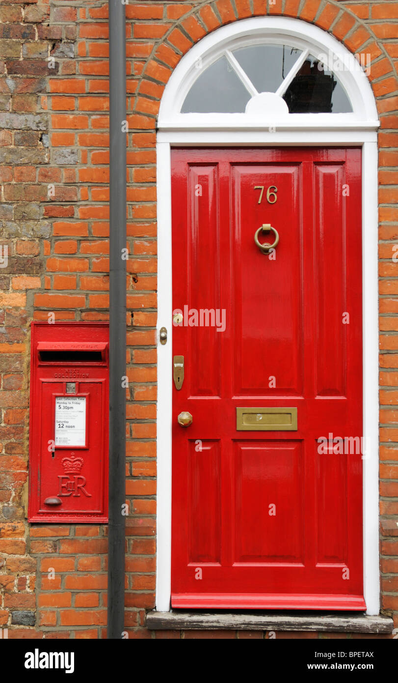 A red letter box in the wall of 76 Fishpool Street, St Albans, UK. Stock Photo