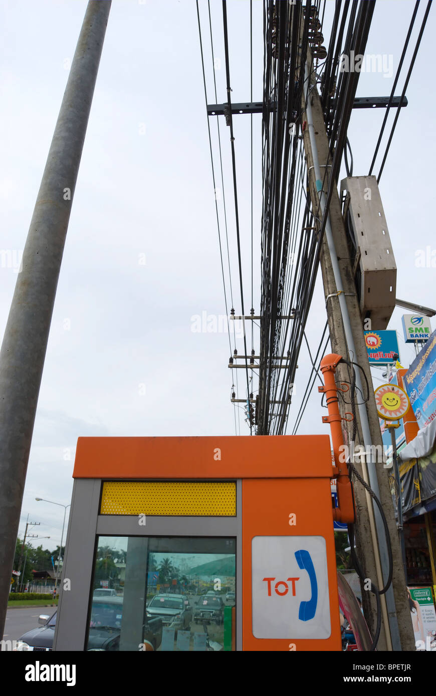 public telephone box with logo of tot, the telephone organisation of thailand, in phetchabun, thailand, south east asia Stock Photo
