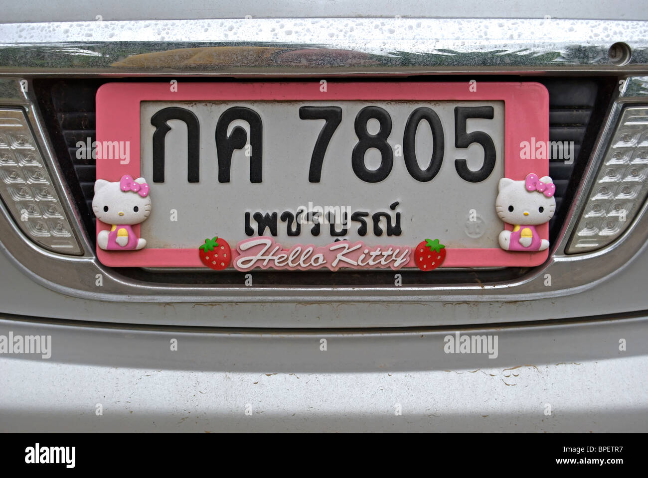 pink hello kitty number plate frame on a toyota car in phetchabun, thailand, south east asia Stock Photo