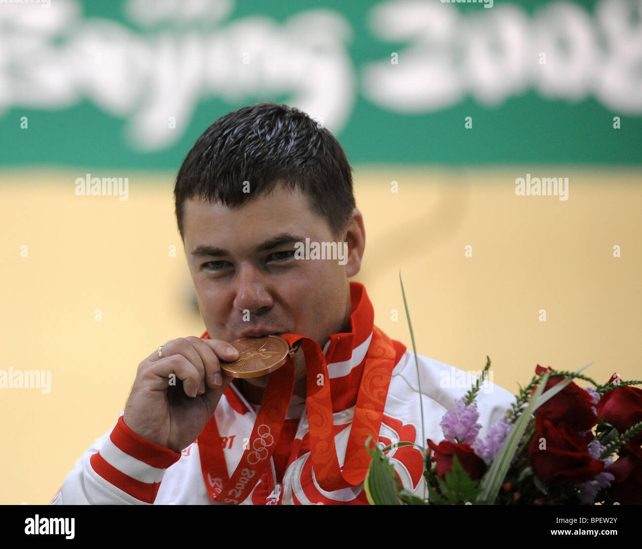 Trap shooters ready to fire a... | Australian Olympic Committee