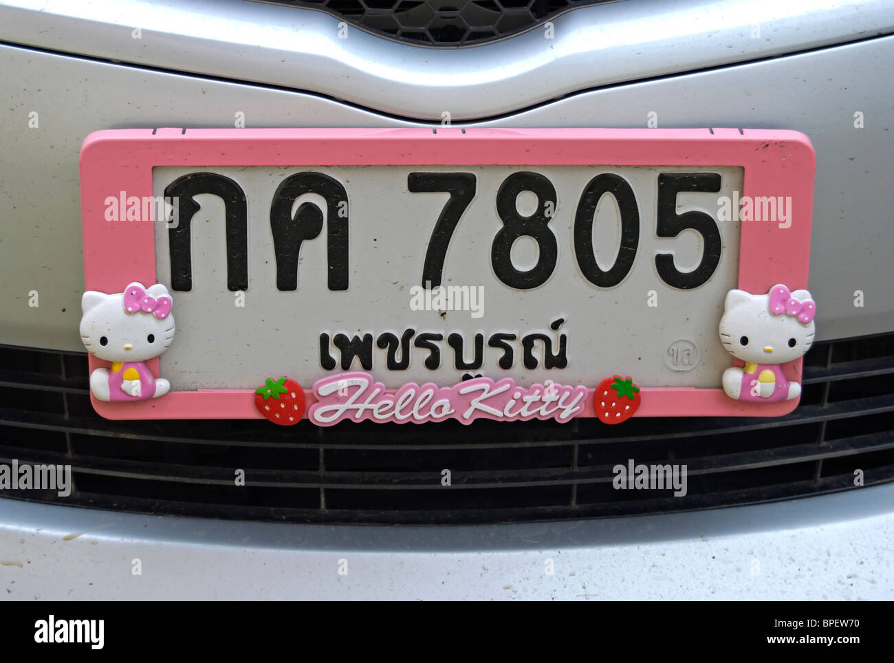 pink hello kitty number plate frame on a toyota car in phetchabun, thailand, south east asia Stock Photo