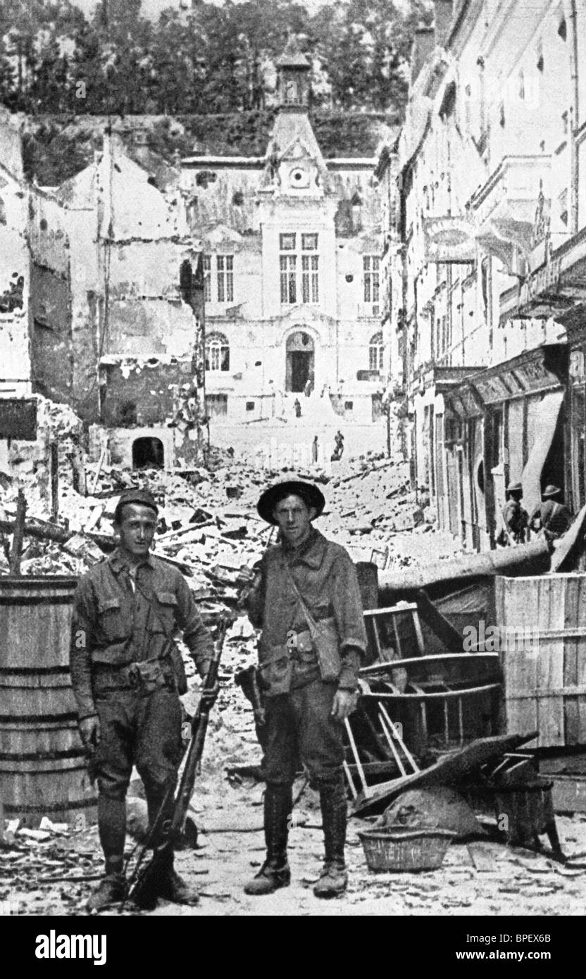 In this 1918 photo, American soldiers are shown near a barricade in the Rue du Pont, Chateau-Thierry, France. The Germans were driven from the town in the First Battle of the Marne, 1914, and again in the Second Battle of the Marne, 1918. Stock Photo