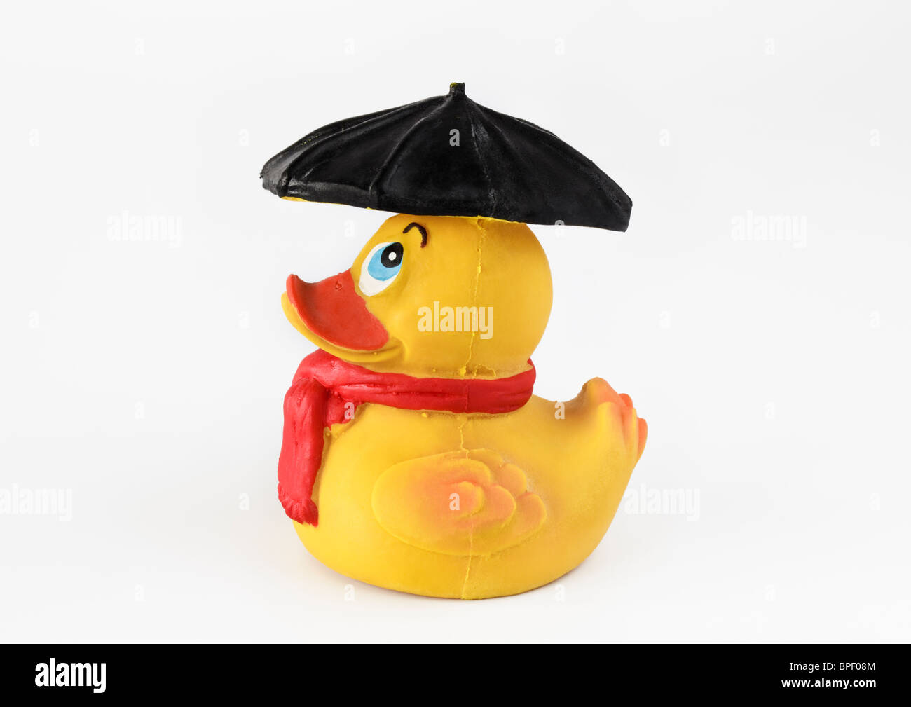 Yellow Rubber Duck with Umbrella Stock Photo