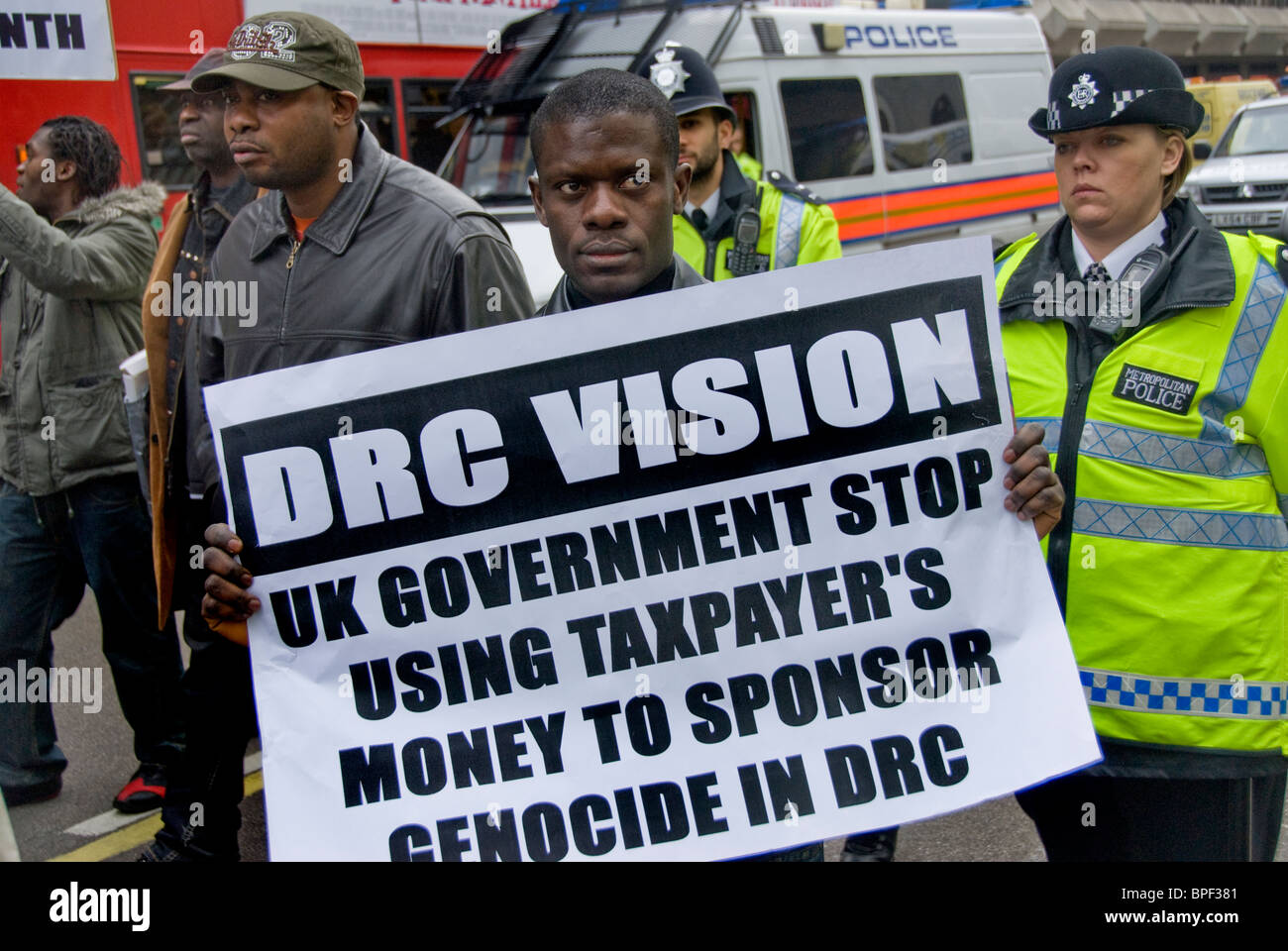 Congolese protest in London against genocide and plunder of natural mineral resources in the Congo Stock Photo