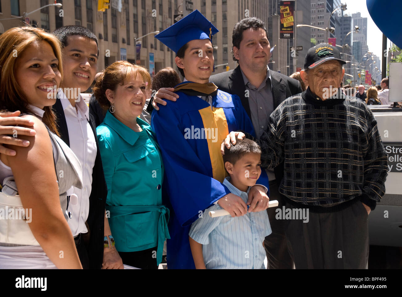 Graduates from Pace University celebrating in New York City following