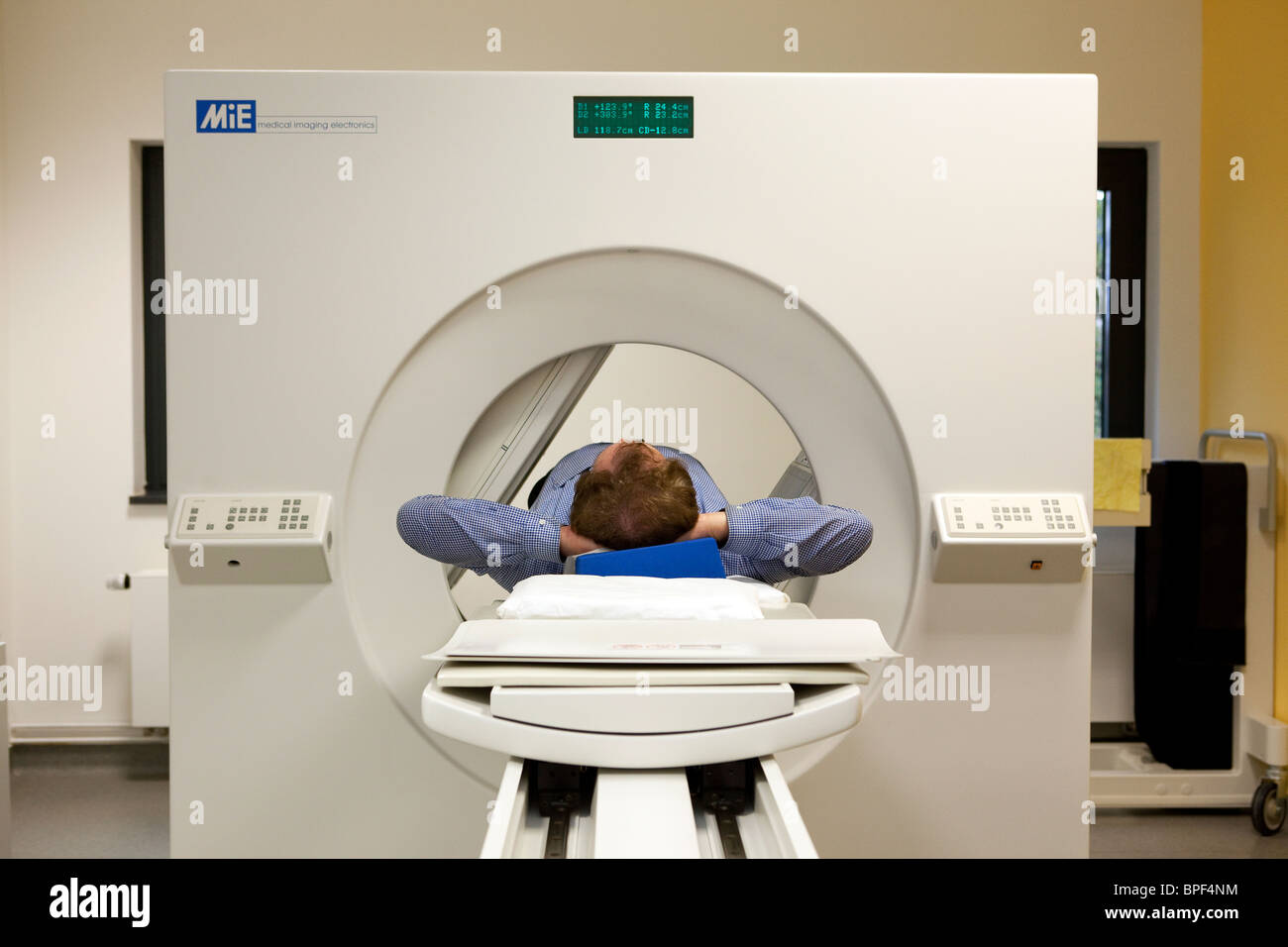 man in a single photon emission computed tomography Stock Photo