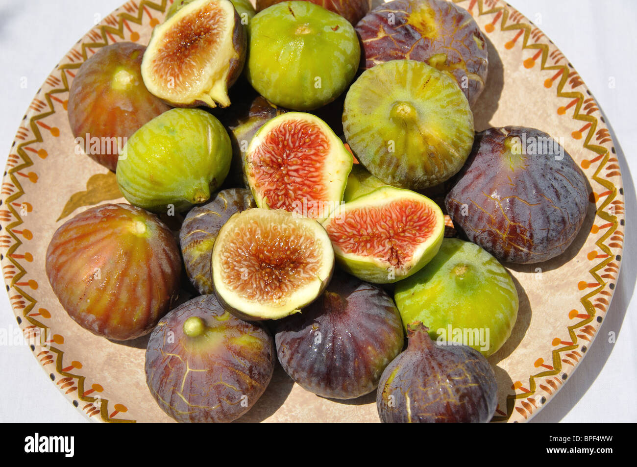 Fresh figs on an old Greek plate Stock Photo Alamy