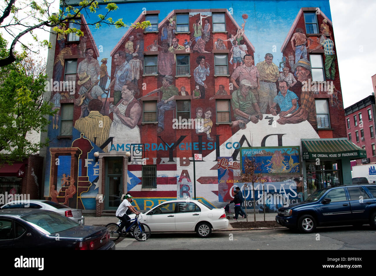 A mural painted in East Harlem New York City portraying the people of