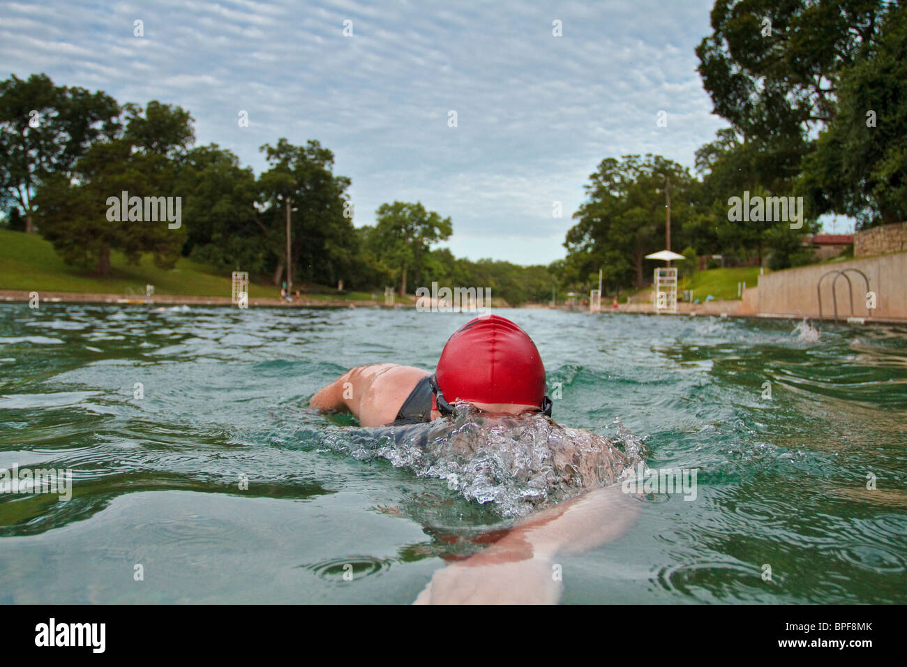 Triathlon swim training in Barton springs natural fed pool, Austin