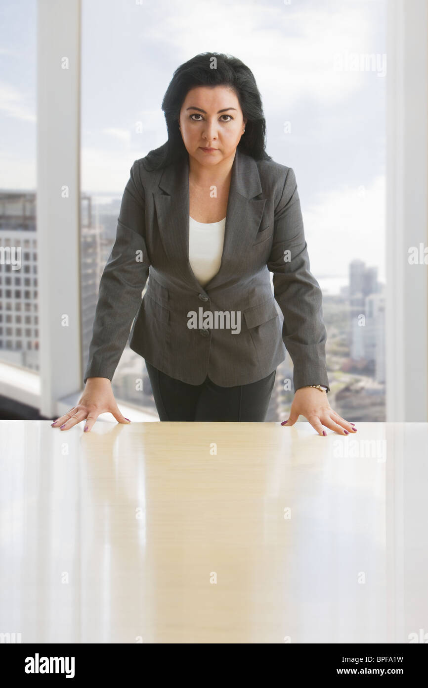 Person leaning on desk hi-res stock photography and images - Alamy