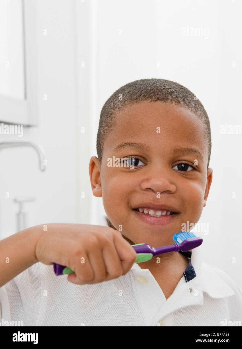 African American Boy Brushing Teeth Stock Photo Alamy