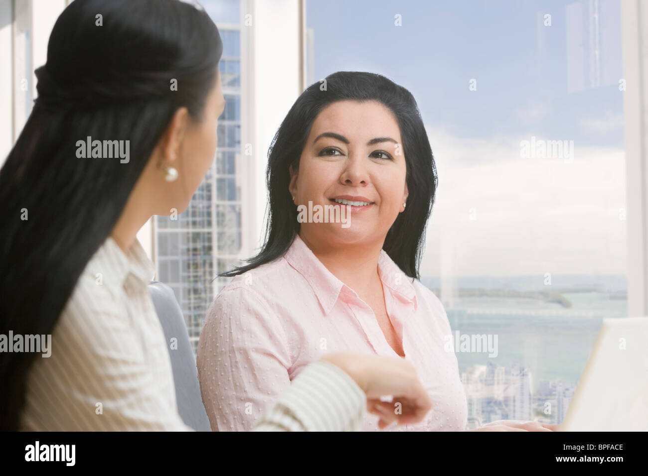 Businesswomen meeting in office Stock Photo - Alamy