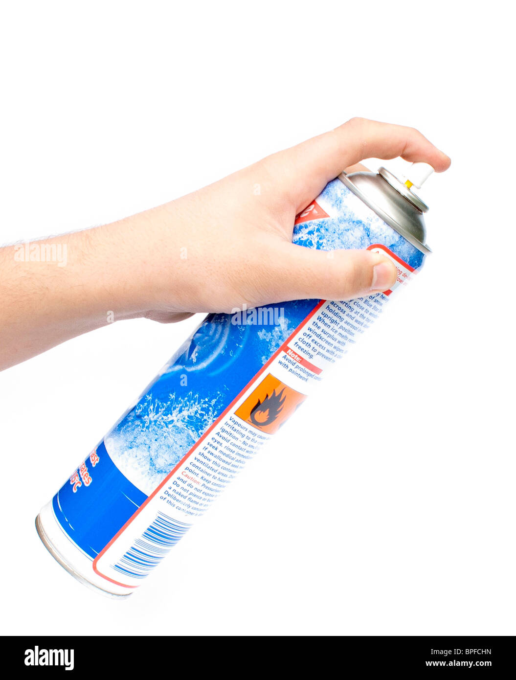 Hand spraying antifreeze Stock Photo