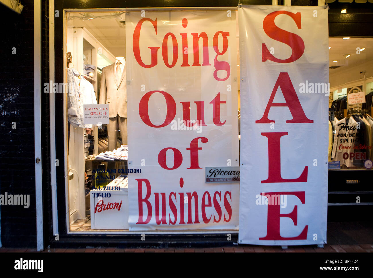 A retail store in Washington, DC with 'Going Out Of Business' signs.  Stock Photo
