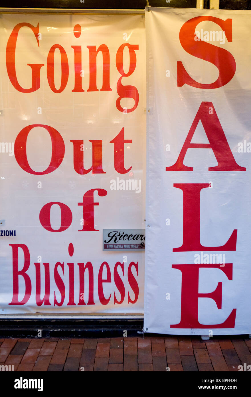 A retail store in Washington, DC with 'Going Out Of Business' signs.  Stock Photo