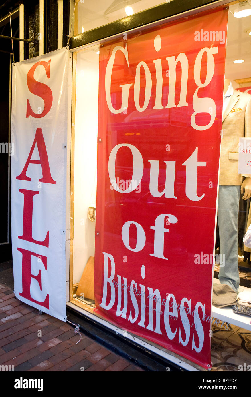 A retail store in Washington, DC with 'Going Out Of Business' signs.  Stock Photo