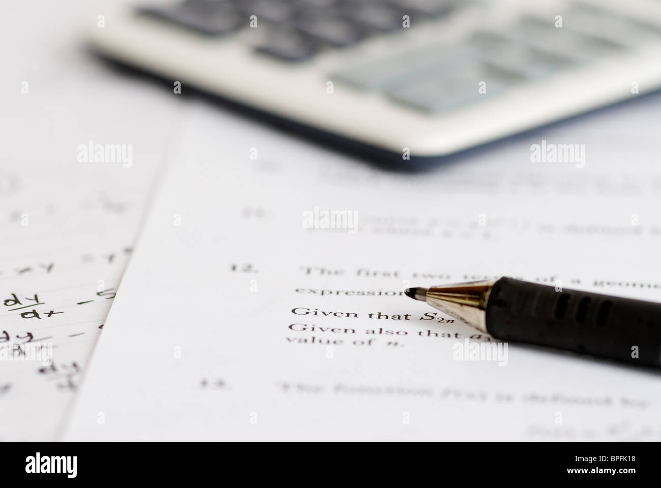 Mathematics questions with rough written answers. Stock Photo