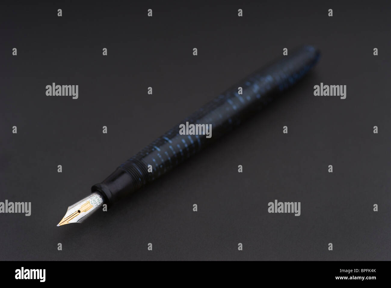 The Gold Ink Pen Is Mightier than the Sword Iridium Point Made in Germany  Stock Photo - Alamy
