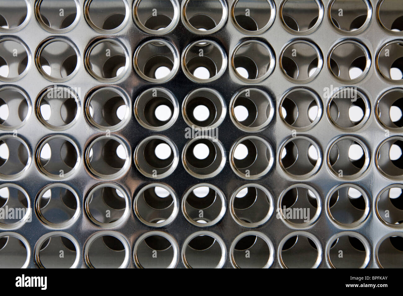 perforated chrome background Stock Photo