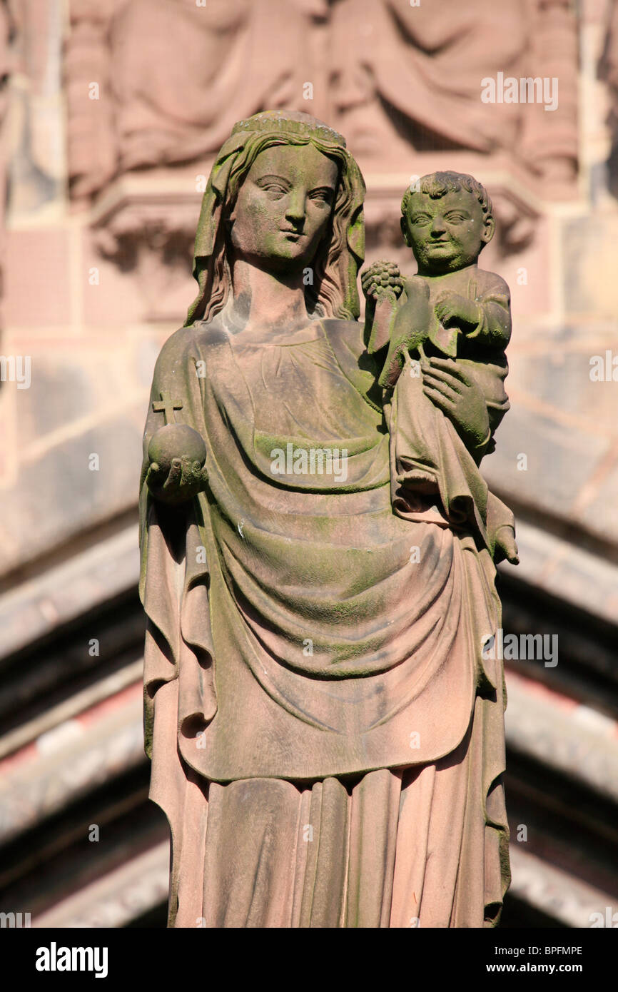 Satue of the Madonna and Child in front of the west door of Freiburg Münster, Baden Wurtemburg, Germany Stock Photo