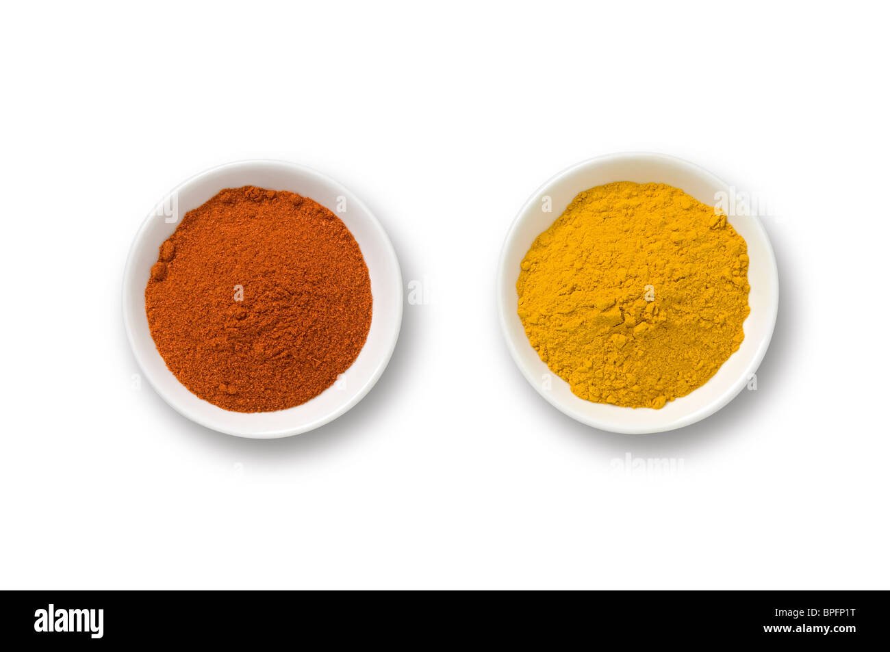 Ground paprika and turmeric powder Stock Photo Alamy