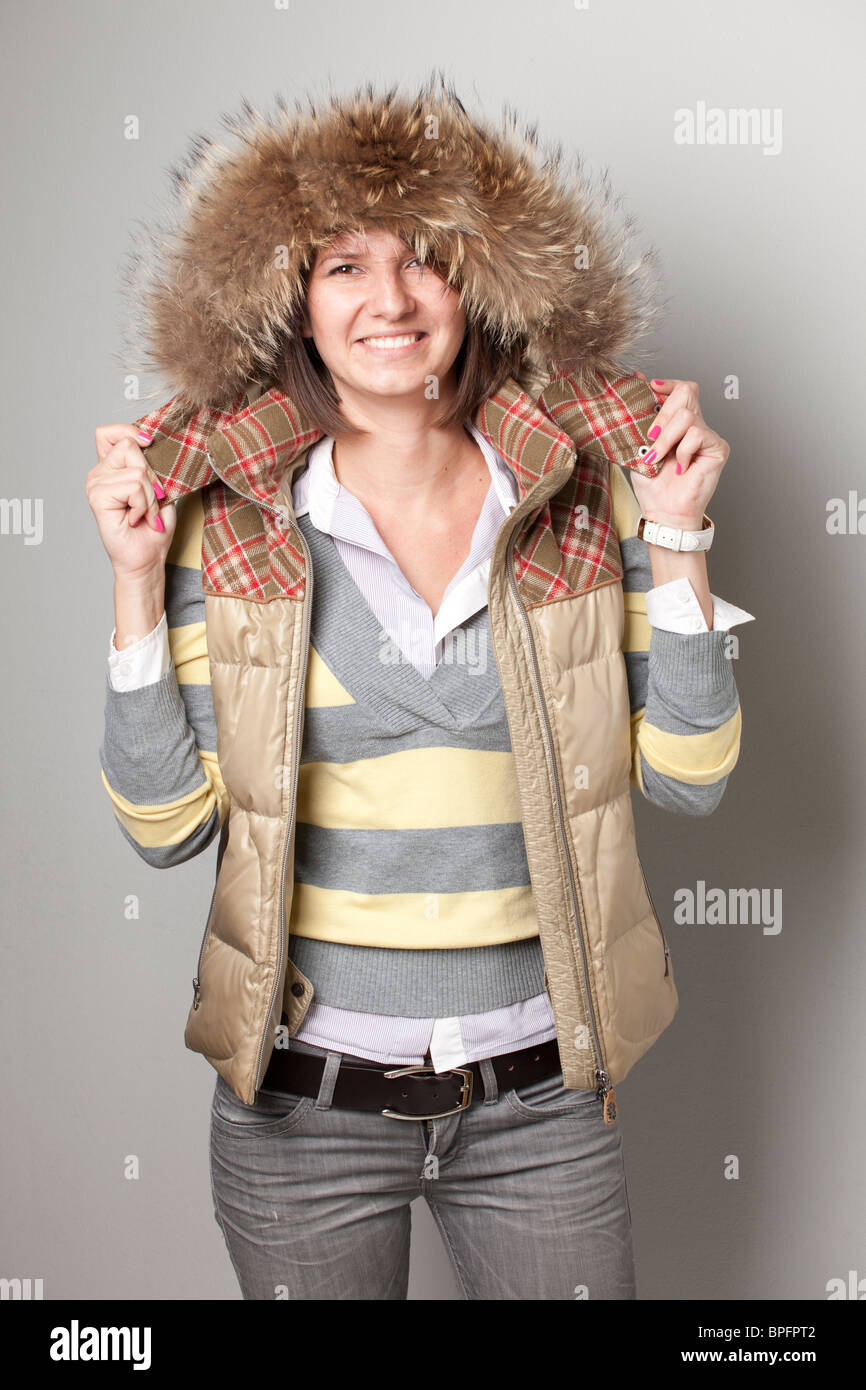 Woman Wearing Parka with Fur Hood Stock Photo - Alamy