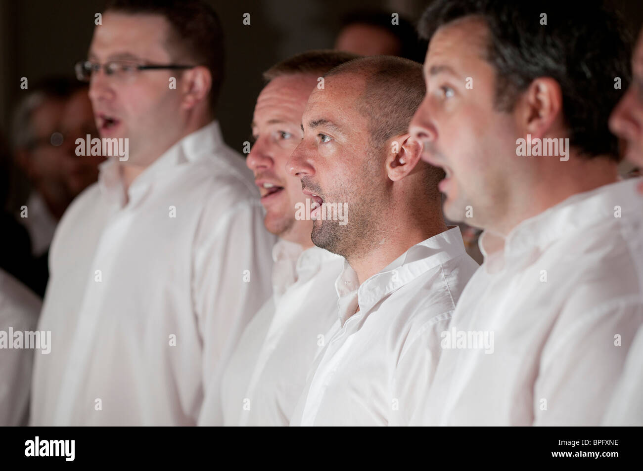 Male voice choir rehearsing at the National Eisteddfod of Wales, Ebbw Vale 2010 Stock Photo