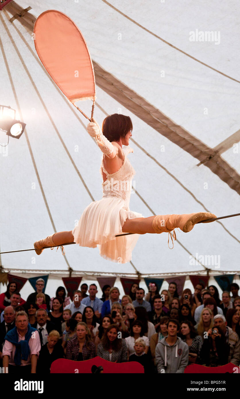 Sarah Schwarz performing her wire walking balancing act at Gifford's Circus Stock Photo