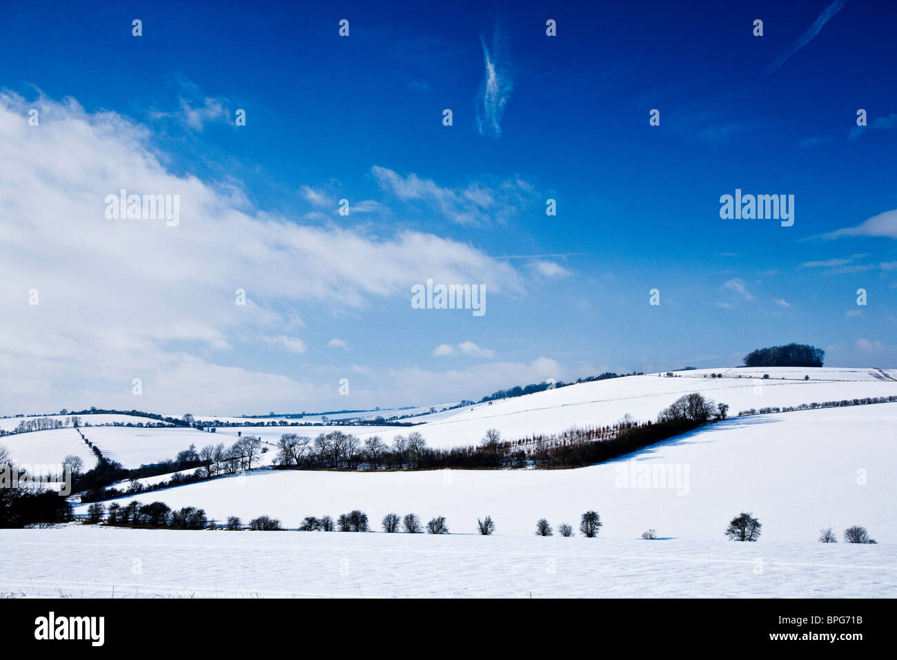 A sunny,snowy,winter landscape view or scene on the Downs in Wiltshire, England, UK Stock Photo