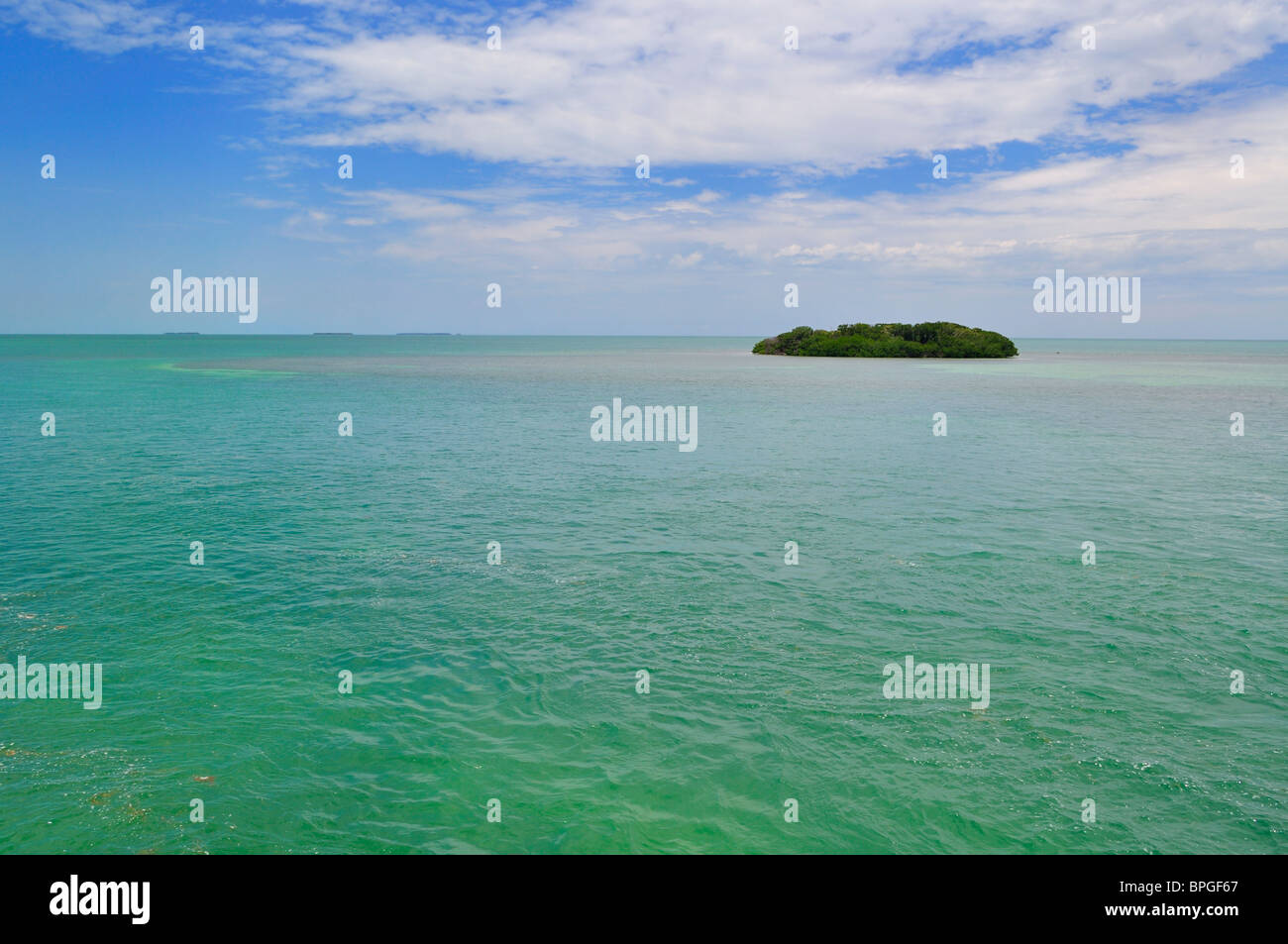 Aqua, colored waters of Florida Bay with solitary island north of the Florida Keys. Stock Photo