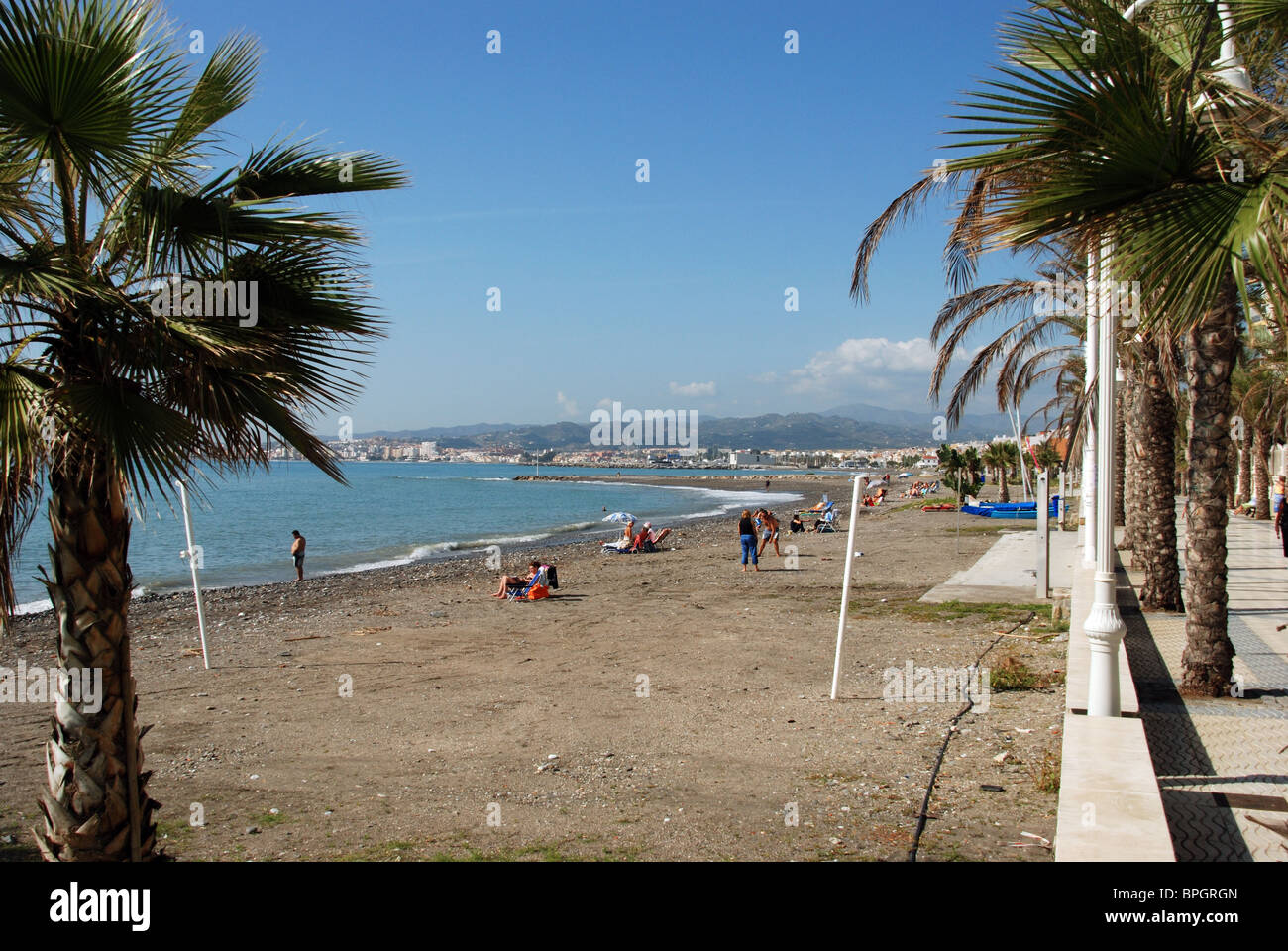 Holidaymakers on the beach, Lagos, Algarrobo Costa, Costa del Sol, Malaga Province, Andalucia, Spain, Western Europe. Stock Photo