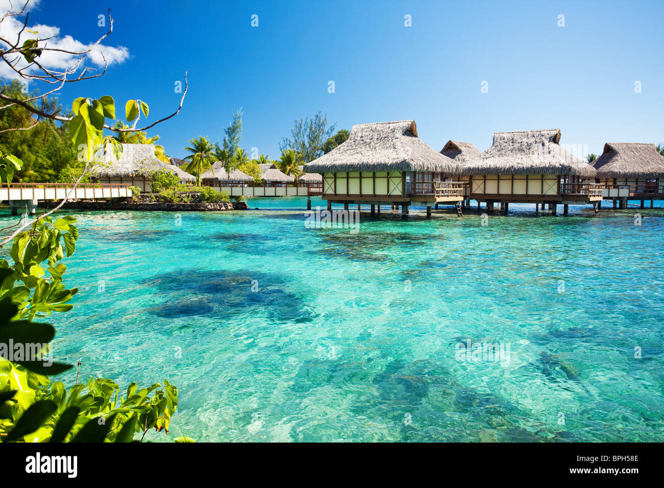 Over water bungalows with over amazing green lagoon Stock Photo