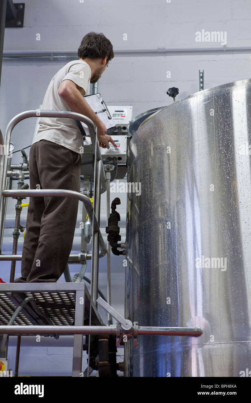Technician working at an industrial control panel Stock Photo Alamy