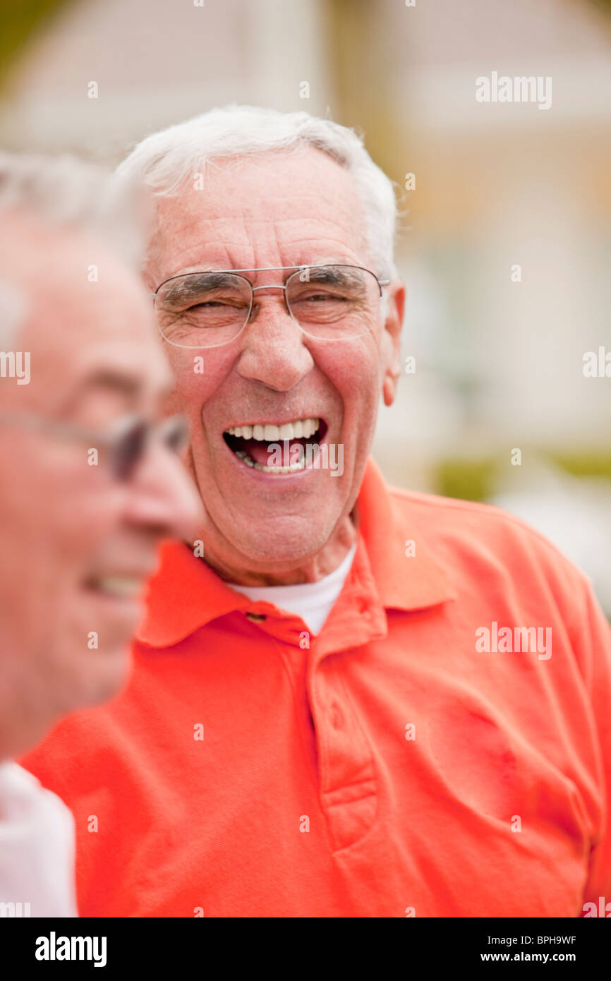 Men laughing together Stock Photo