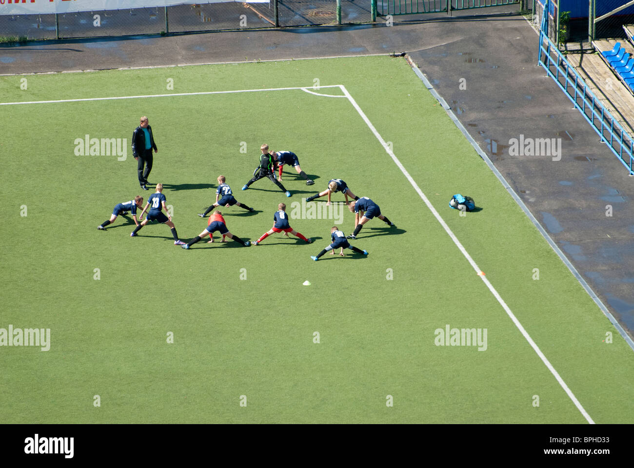 Training of Russian kids football team before a match Stock Photo