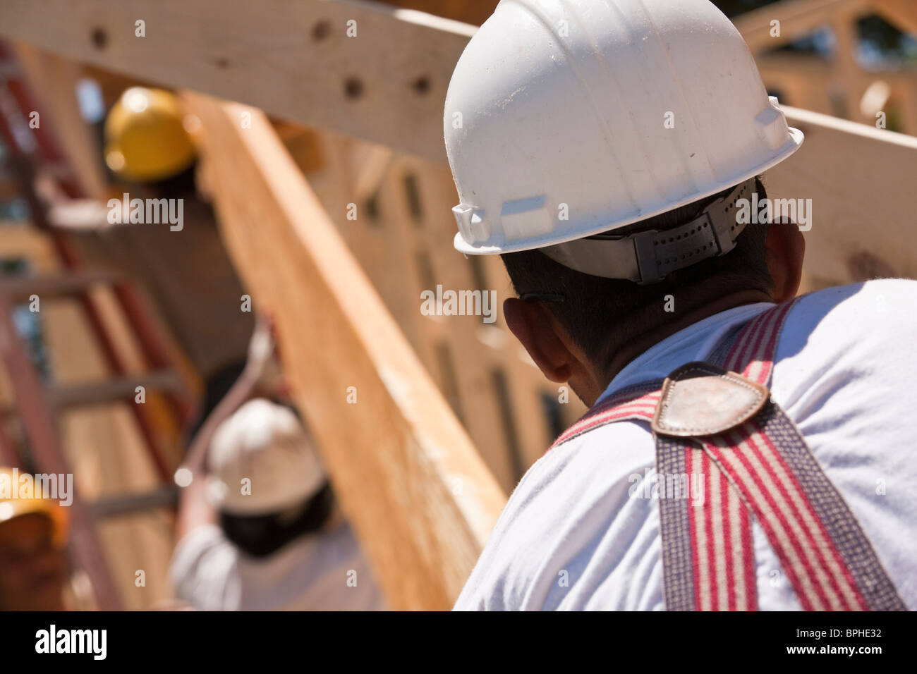 Carpenters lifting a beam Stock Photo Alamy
