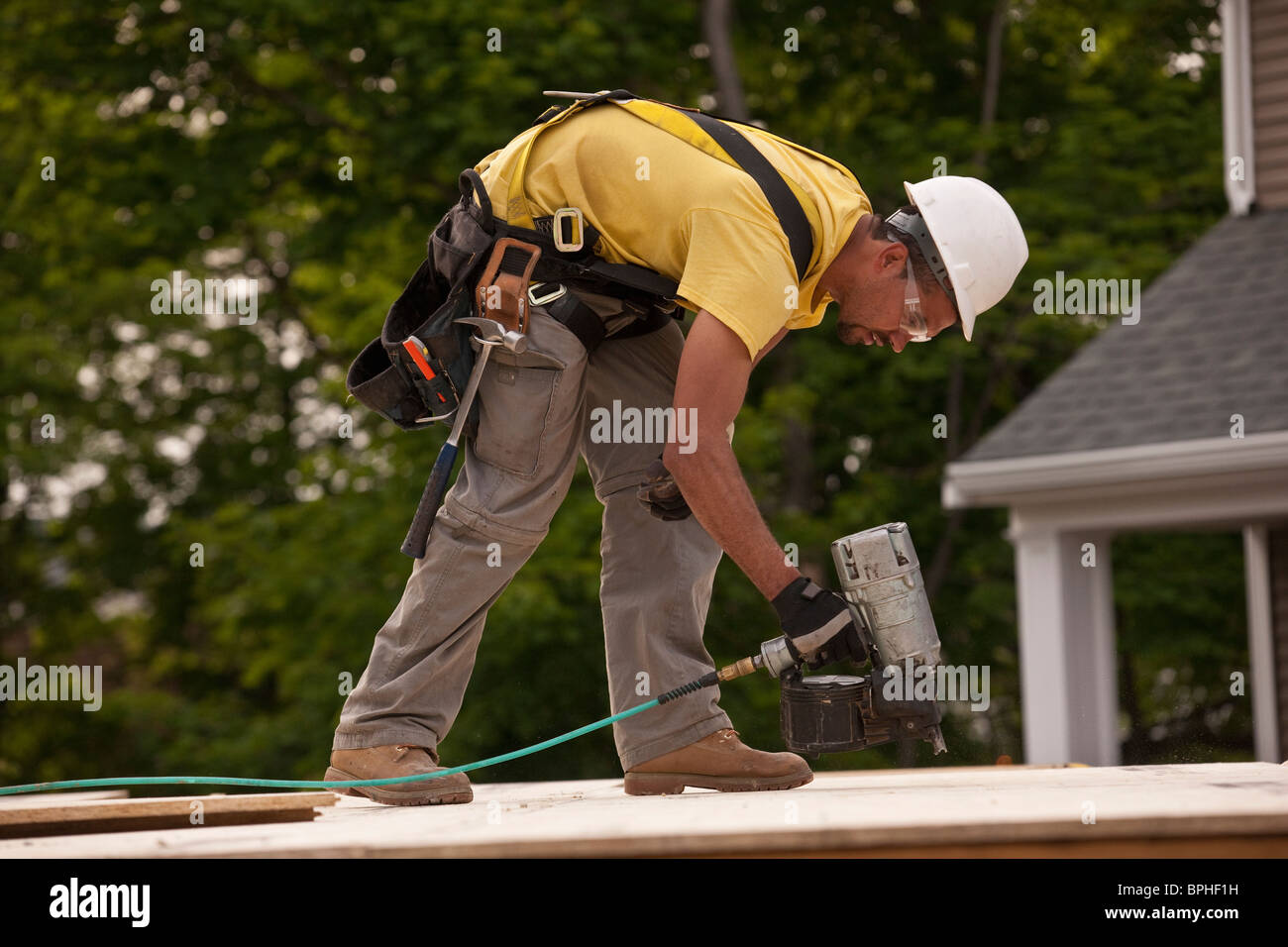 Nail gun hires stock photography and images Alamy