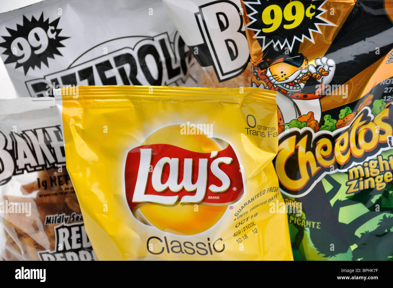 Junk food snacks potato chips, cheetos, tostitos, doritos