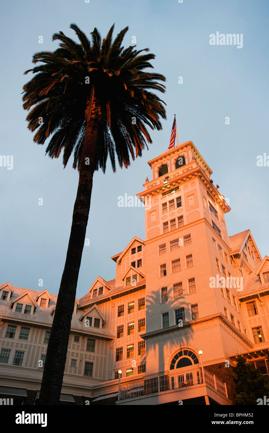 Claremont Hotel and Resort, Historic Hotel, Berkeley, California USA, Dusk with Palm Tree Stock Photo