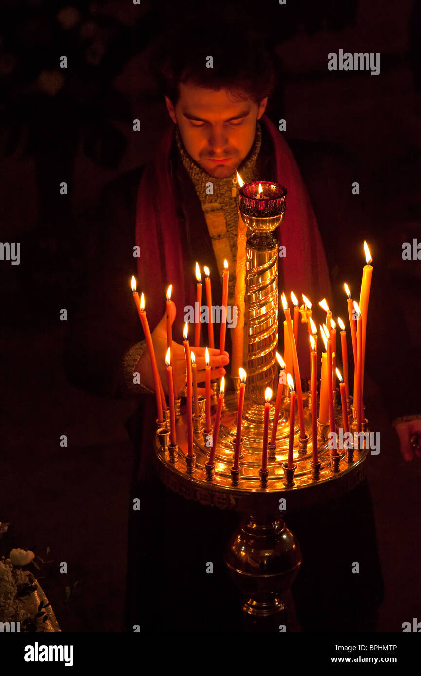 Man lighting candle russian orthodox hires stock photography and