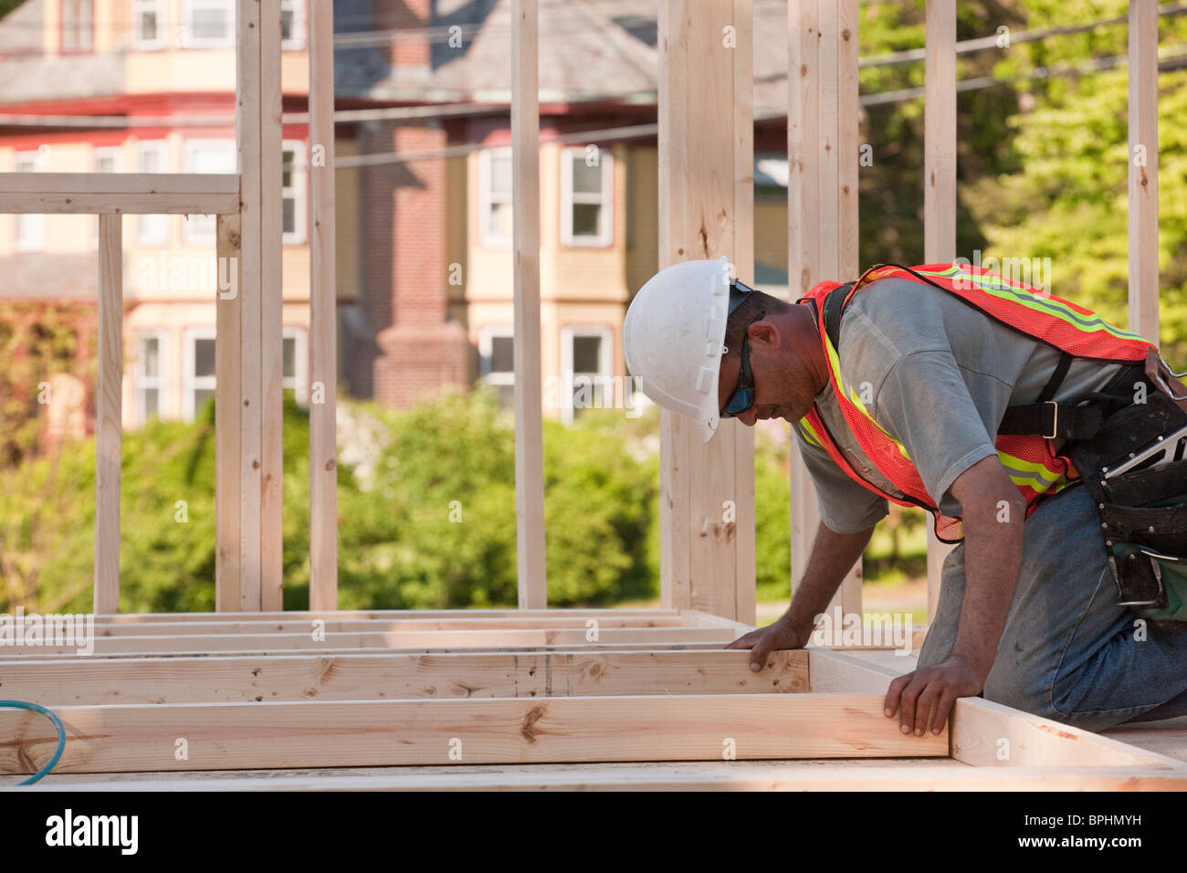 Carpenter placing wall studs hires stock photography and images Alamy