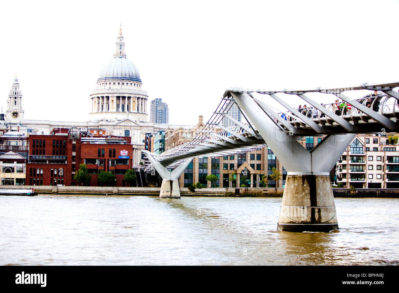 The Millennium Footbridge over the River Thames with St Paul's Cathedral in the background, London, England, UK Stock Photo