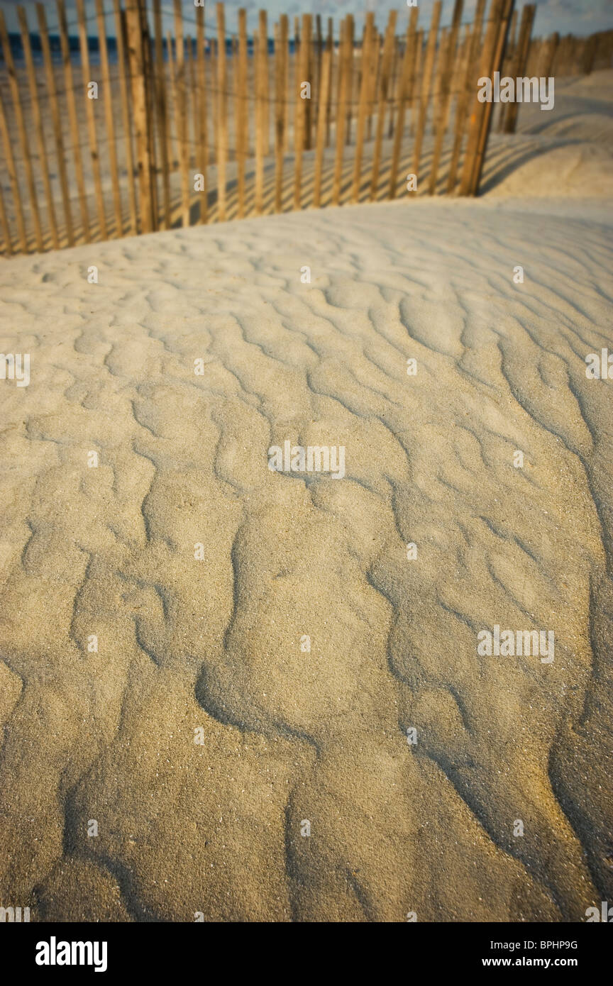 Sand Patterns From Wind In Sand Dune With Fence, Hilton Head Island, USA Stock Photo
