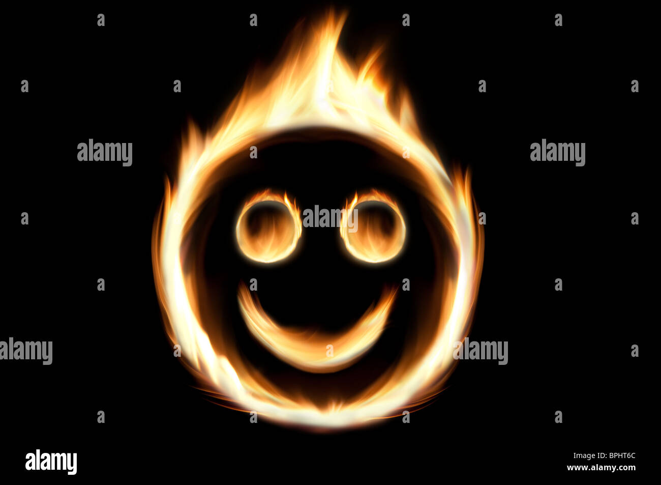 Fire smiley - fire flames in shape of a smiling face. Stock Photo